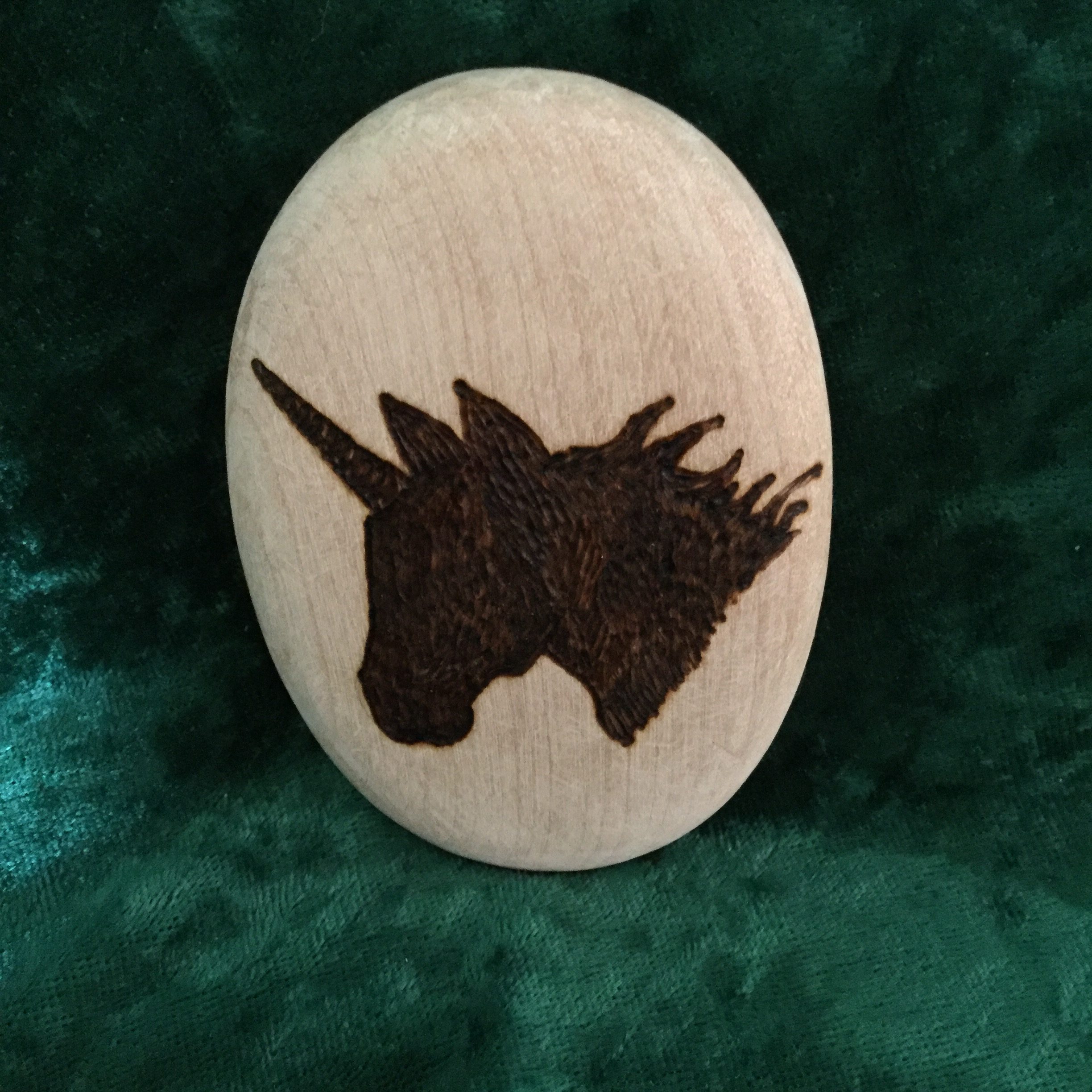 Oval wooden pebble - unicorn