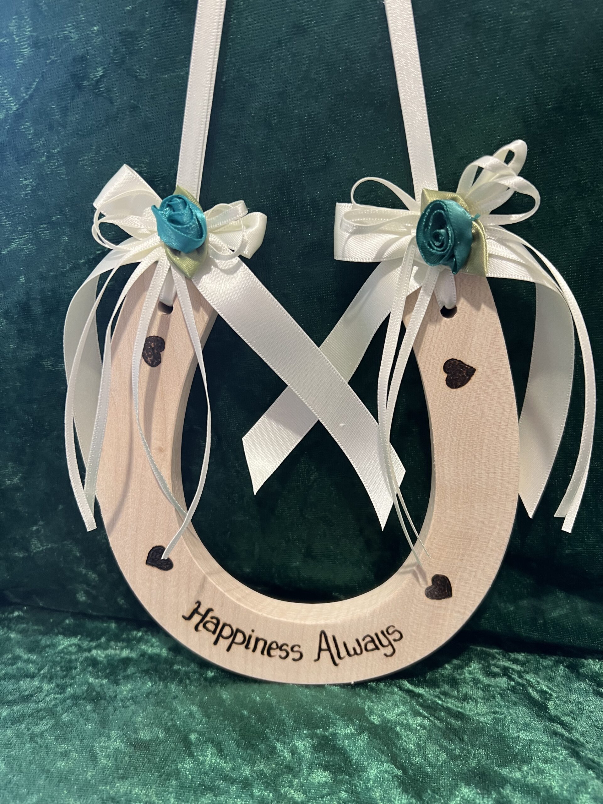 Heart Wedding Horseshoe with large teal ribbon rosebud