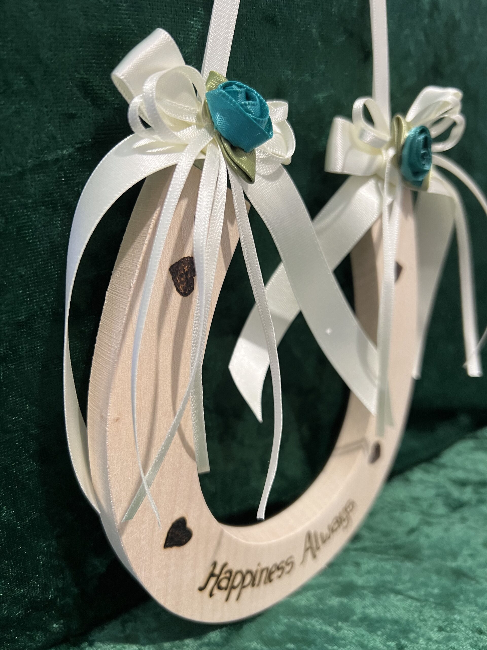 Heart Wedding Horseshoe with large teal ribbon rosebud